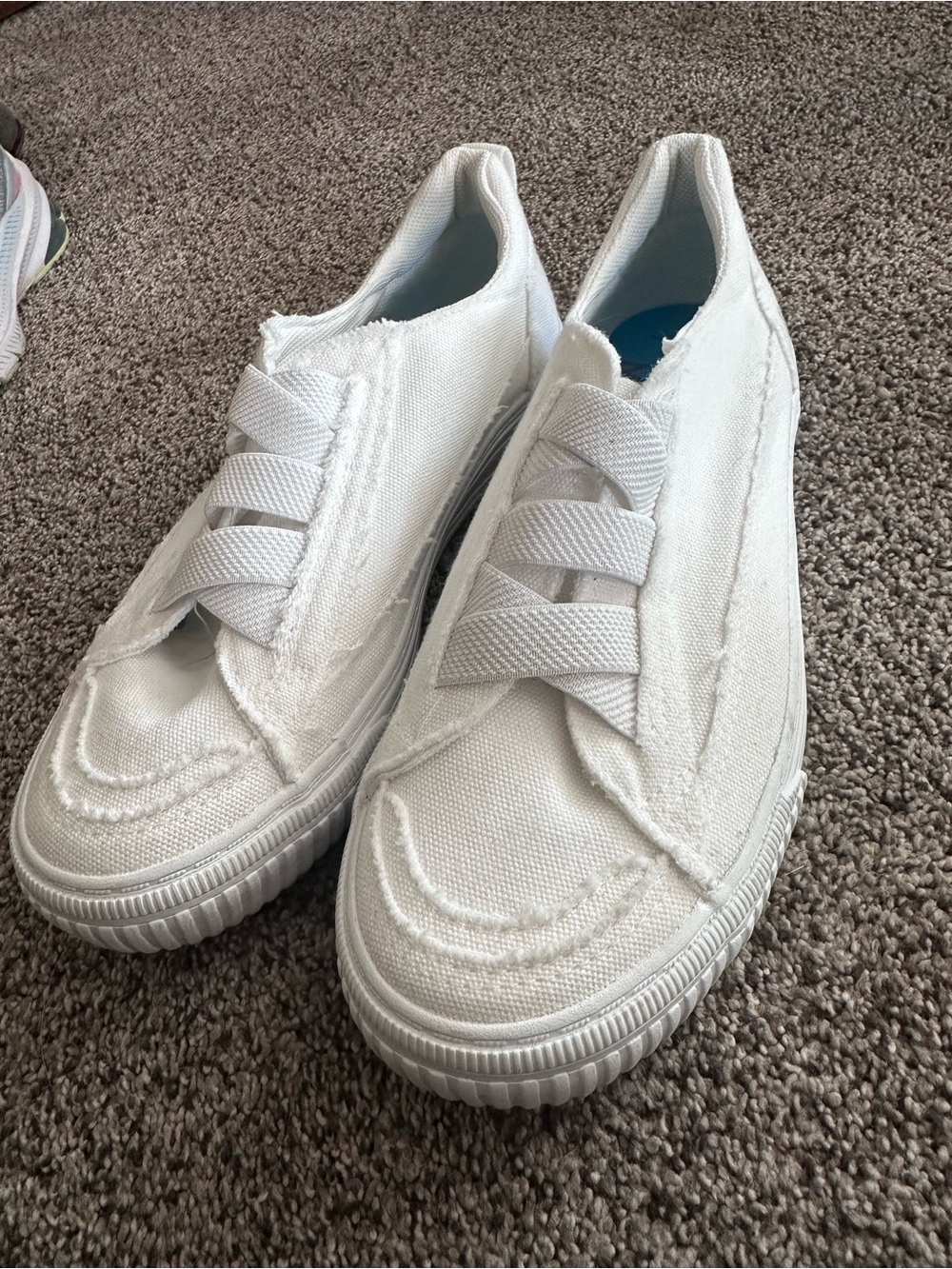 Women’s White Canvas Slip-On Sneakers